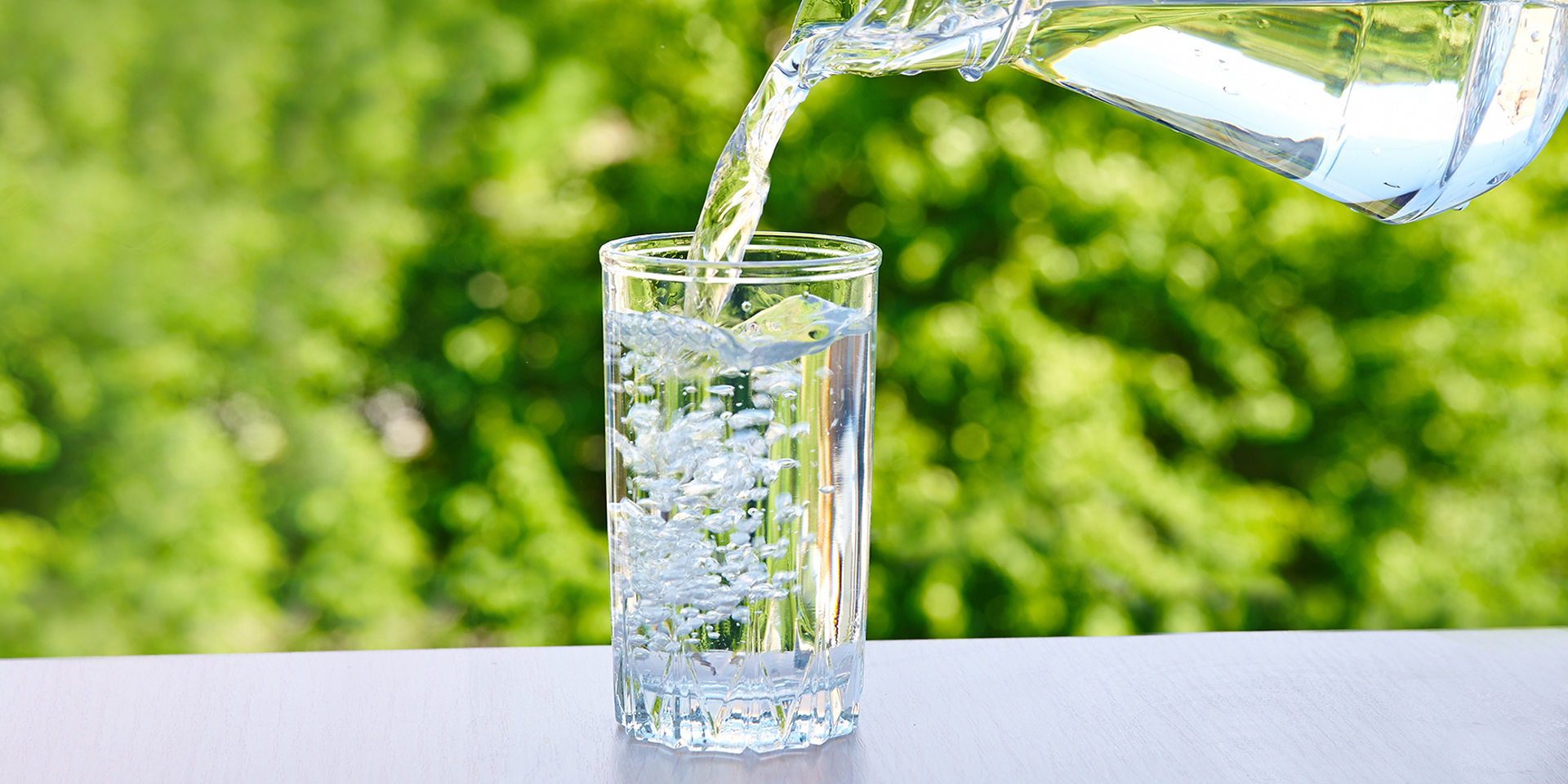 Water being poured into a glass.