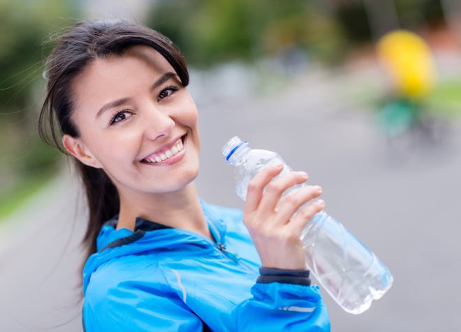 4 Tips for Staying Hydrated Image https://go.standardprocess.com/hubfs/Stock%20images/Woman%20hydrating%20after%20workout%20drinking%20water%20from%20a%20bottle.jpeg 1 