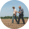 charlie-and-jack-dubois-walking-in-standard-process-field@2x