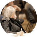 person-taking-notes-at-standard-process-conference@2x